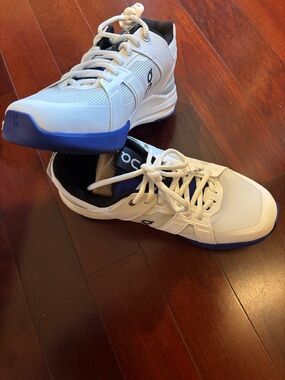 On Running women,s White Athletic Shoes with Blue Accents